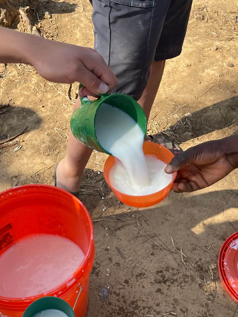 Pouring Milk in Africa